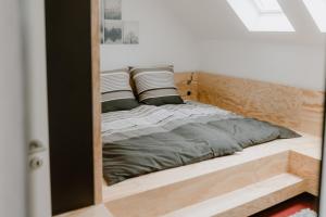 Ein Bett oder Betten in einem Zimmer der Unterkunft Appartement Am Salzbergtal
