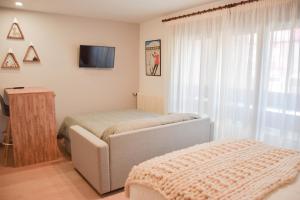 Postel nebo postele na pokoji v ubytování Envalira Vacances - Roc