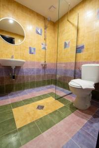 A bathroom at The Legends , Art & Forest Még 37 kép