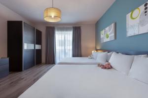 Hotel Argentoにあるベッド