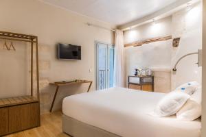 Postel nebo postele na pokoji v ubytování Hotel Off
