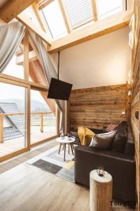Posedenie v ubytovaní Apartament Stary Drewniany Białka Ski Resort -obok Termy Bania i Kotelnica