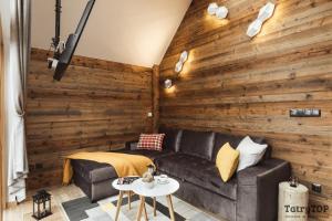 Posedenie v ubytovaní Apartament Stary Drewniany Białka Ski Resort -obok Termy Bania i Kotelnica