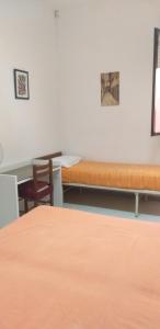 Cama ou camas em um quarto em Casa Vacanze Porto Cesareo 2