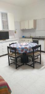 A cozinha ou cozinha compacta de Casa Vacanze Porto Cesareo 2