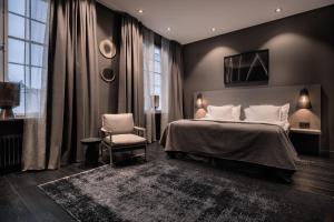 The Lamp Hotel & Spa客房内的一张或多张床位