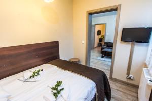 Telewizja i/lub zestaw kina domowego w obiekcie Apartamenty Izerskie - ul. Cicha 13H-I