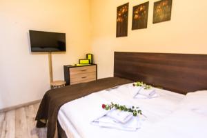 Łóżko lub łóżka w pokoju w obiekcie Apartamenty Izerskie - ul. Cicha 13H-I