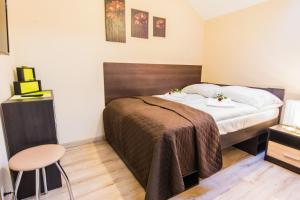 Łóżko lub łóżka w pokoju w obiekcie Apartamenty Izerskie - ul. Cicha 13H-I