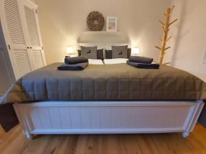Кровать или кровати в номере Reinhardshäusle Pension & Wellness