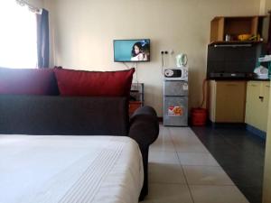 Kuchyň nebo kuchyňský kout v ubytování Kim Suites - Mvuli Studio Apartment + 12 fotografií