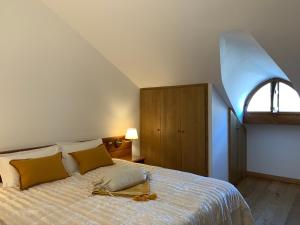 Postel nebo postele na pokoji v ubytování Hotel Serena Cortina