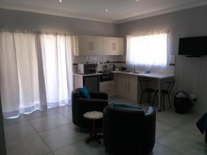 Kuchyň nebo kuchyňský kout v ubytování 1150 on Bain - Self Catering
