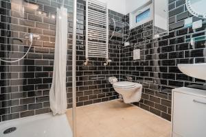 Koupelna v ubytování Motel Home Berlin + 37 fotografií