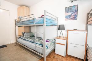 Postel nebo postele na pokoji v ubytování Motel Home Berlin