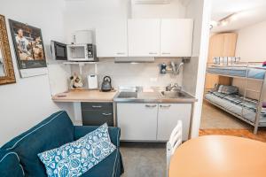 Kuchyň nebo kuchyňský kout v ubytování Motel Home Berlin