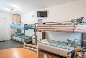 Postel nebo postele na pokoji v ubytování Motel Home Berlin
