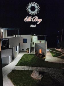 a view of a house with a sign that says all day at Ellibay in Livadia