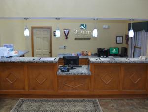 a waiting room at an office with a cash register at Quality Inn & Suites Dublin in Dublin