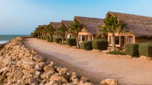 a row of houses on the beach near the ocean at Westpoint Dakhla in Dakhla +26 photos