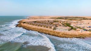 an aerial view of the shoreline of a beach at Westpoint Dakhla in Dakhla