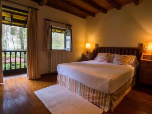 Ένα ή περισσότερα κρεβάτια σε δωμάτιο στο Corrada Torales