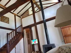 TV a/nebo společenská místnost v ubytování Casa Guareña