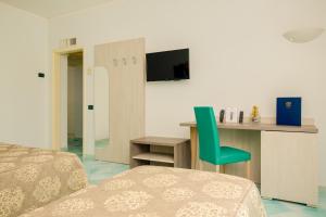 TV a/nebo společenská místnost v ubytování Hermitage Resort & Thermal Spa
