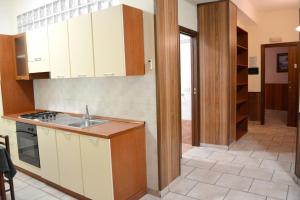 Η κουζίνα ή μικρή κουζίνα στο Comfortable apartment in Reggio Calabria - 34 m² with parking
