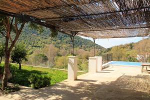 a view from the patio of a villa at Charming Villa in Benamahoma + Pool in Benamahoma