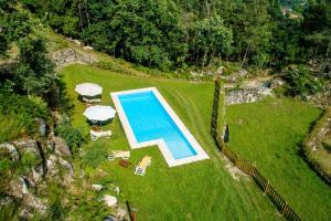 Afbeelding uit fotogalerij van 2 bedrooms house with shared pool enclosed garden and wifi at Vilar de Ferreiros in Vilar de Ferreiros