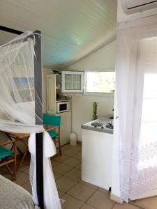 Köök või kööginurk majutusasutuses Appartement moderne à Le Lamentin avec piscine partagée - 20m²