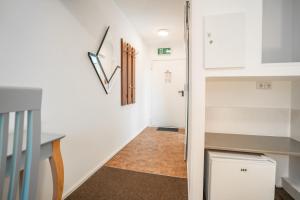 Kuchyň nebo kuchyňský kout v ubytování Motel Home Berlin