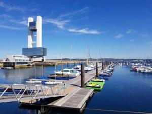 a group of boats docked at a marina at Spacious house with terrace and balcony in A Coruña in A Coruña