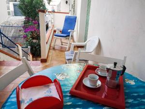Posezení v ubytování Charming Apartment in Alcamo - 50 m² - Balcony and Parking