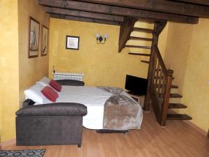A bed or beds in a room at One bedroom appartement at El Tarter 10 m away from the slopes with furnished terrace and wifi