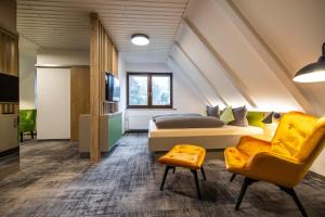 TV a/nebo společenská místnost v ubytování Pension & Café Abendröte