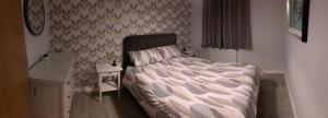 Chapel Court Apartments客房内的一张或多张床位