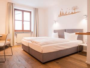 Letto o letti in una camera di Fuchsbräu