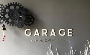 Certifikát, hodnocení, plakát nebo jiný dokument vystavený v ubytování Garage con camere