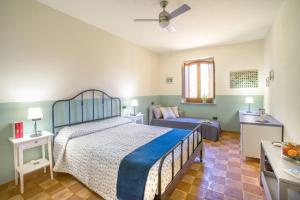 Posteľ alebo postele v izbe v ubytovaní Torrenova di Assisi Country House