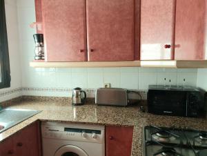 Kuchyňa alebo kuchynka v ubytovaní Apartamento Porticada