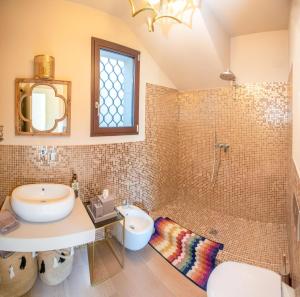 Ванная комната в Villa D`Amore