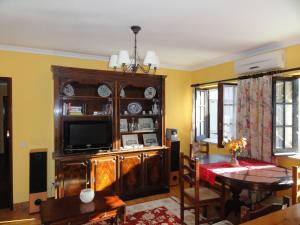 TV a/nebo společenská místnost v ubytování Cottage Sete Mares
