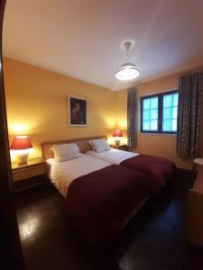 Postel nebo postele na pokoji v ubytování Cottage Sete Mares