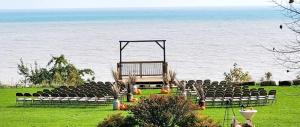 a set up for a wedding in front of the ocean at Lake Orchard Farm Retreat in Sheboygan