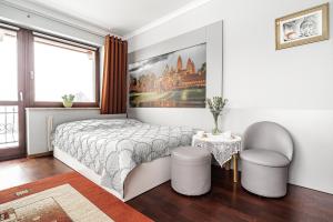 Ένα ή περισσότερα κρεβάτια σε δωμάτιο στο Willa Jaś I Małgosia