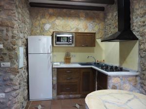 Kuchyň nebo kuchyňský kout v ubytování Casa Rural Cortijo Pesquera
