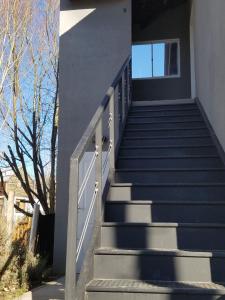 a set of stairs leading up to a building at DEPARTAMENTO CALAFATE CENTRICO #3 in El Calafate