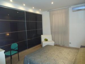 Ένα ή περισσότερα κρεβάτια σε δωμάτιο στο La Sora Bice